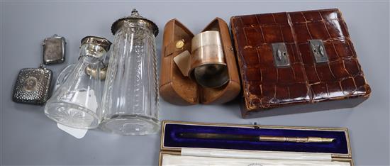 Small silver including two vesta cases, a mounted glass whisky tot, a sugar castor etc. and a yellow metal overlaid pen.